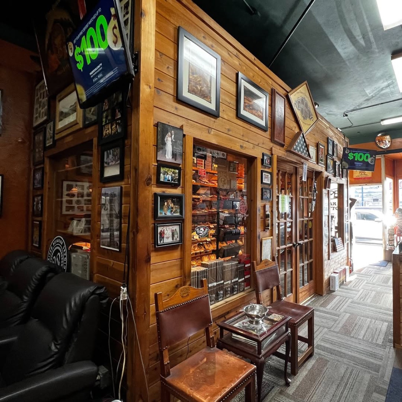 Leather seating beside the walk-in humidor at Cigar Grotto